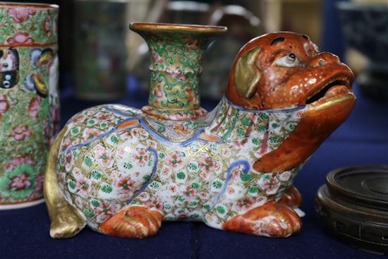 A Japanese Kutani porcelain lion dog candlestick, enamelled and gilt decoration and a Canton vase candlestick height 10cm